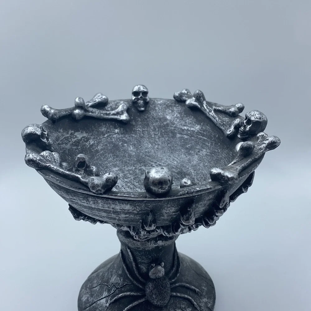 Halloween decorative skulls bones and spider chalice
